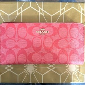Coach pink zip around wallet